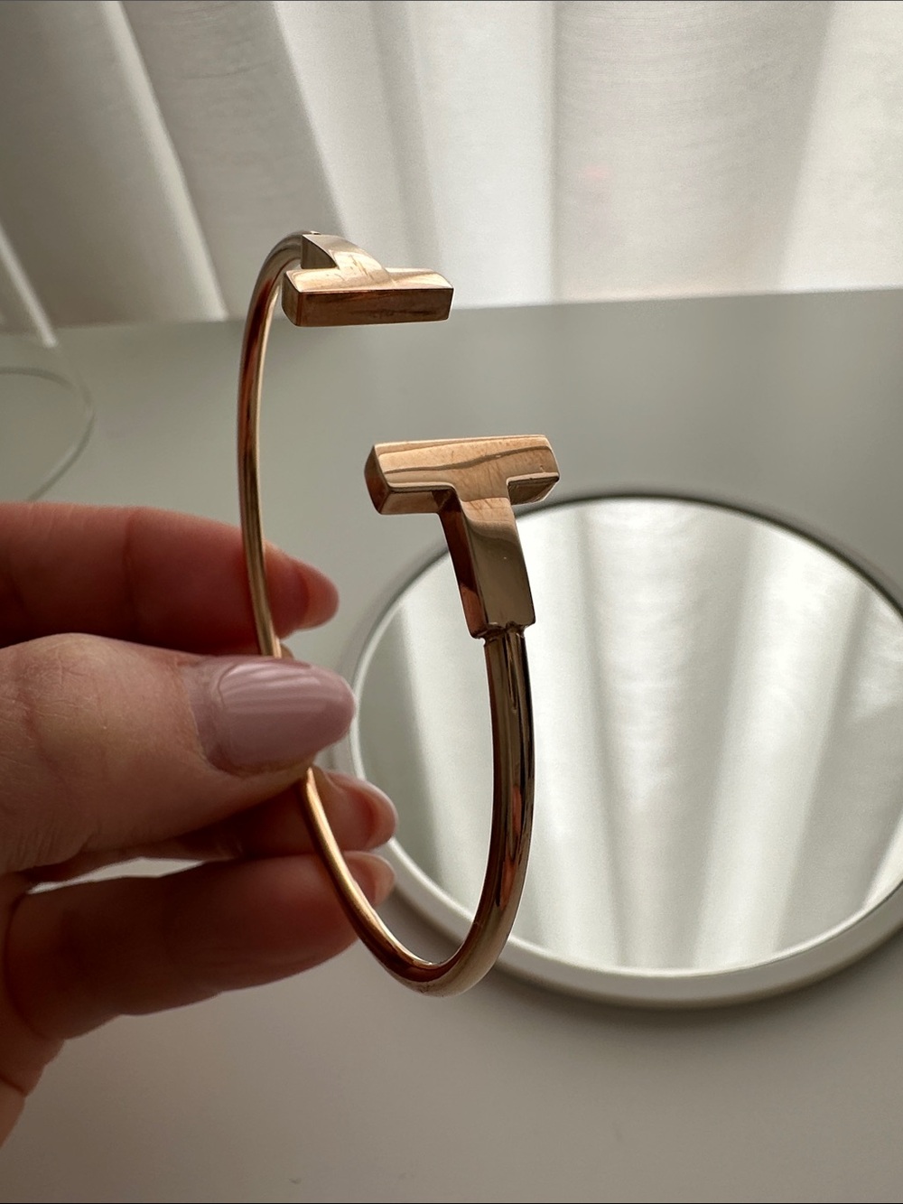 Rose gold color brass bracelet with TT design